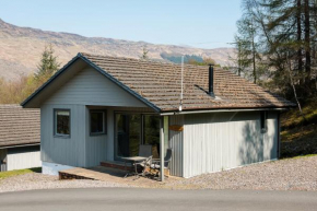 Deerstalker Lodge cozy lodge with wood burner